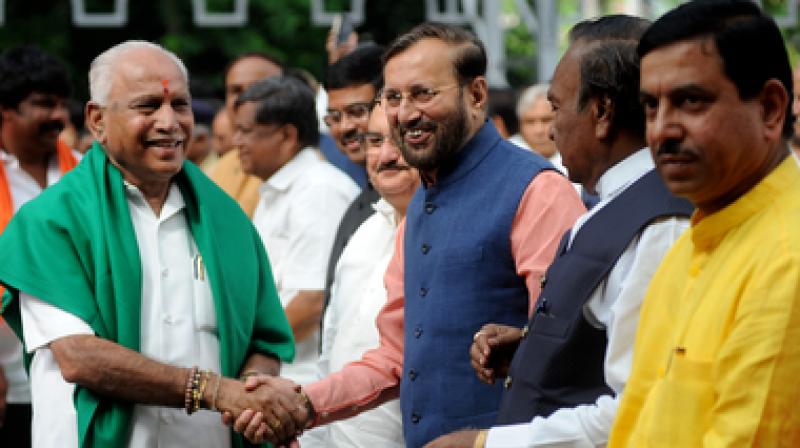 The marathon three-day political slugfest in the state culminated in B S Yeddyurappa resigning as chief minister on Saturday after he failed to muster support of seven additional MLAs to ensure he remained in office. (Photo: PTI) The marathon three-day political slugfest in the state culminated in B S Yeddyurappa resigning as chief minister on Saturday after he failed to muster support of seven additional MLAs to ensure he remained in office. (Photo: PTI)