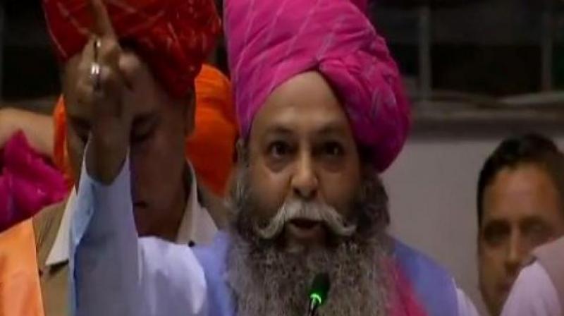 In his resignation letter which he forwarded to state BJP chief Subhash Barala over WhatsApp, Amu stated that he was upset over chief minister Manohar Lal Khattar allegedly skipping a meeting with representatives of the Karni Sena on Tuesday. (Photo: ANI/Twitter) In his resignation letter which he forwarded to state BJP chief Subhash Barala over WhatsApp, Amu stated that he was upset over chief minister Manohar Lal Khattar allegedly skipping a meeting with representatives of the Karni Sena on Tuesday. (Photo: ANI/Twitter)