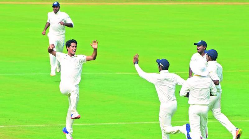 Tamil Nadu pacer K. Vignesh celebrates the fall of Karun Nair on the second day of their Ranji Trophy quarter-final. (Photo: K. MURALI KRISHNA) Tamil Nadu pacer K. Vignesh celebrates the fall of Karun Nair on the second day of their Ranji Trophy quarter-final. (Photo: K. MURALI KRISHNA)