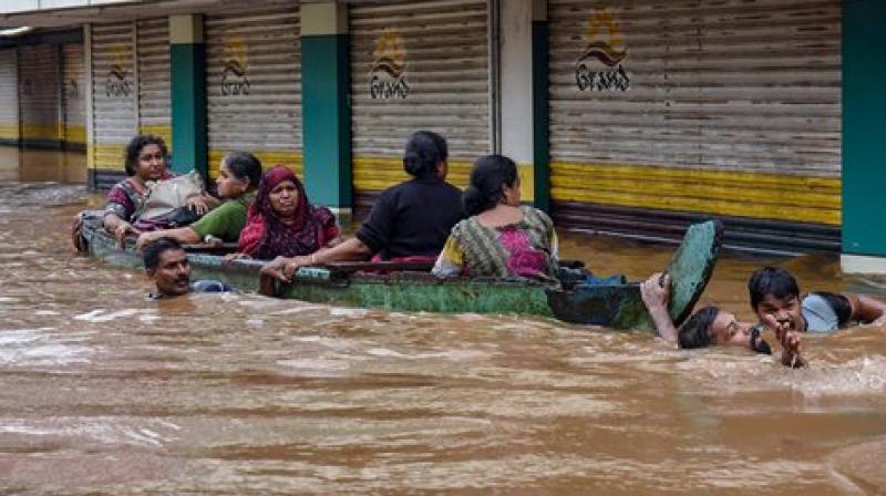 People being rescued from a flood-affected region following heavy monsoon rainfall, in Kochi. (Photo: PTI) People being rescued from a flood-affected region following heavy monsoon rainfall, in Kochi. (Photo: PTI)