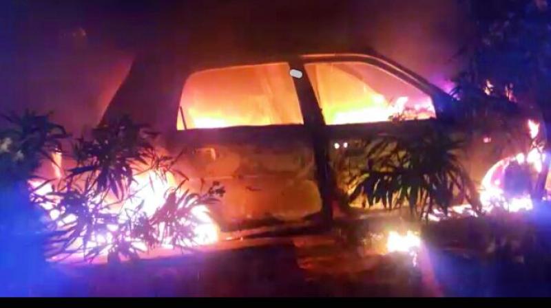 The burnt car that killed Bhuma Rao, a farmer. The burnt car that killed Bhuma Rao, a farmer.