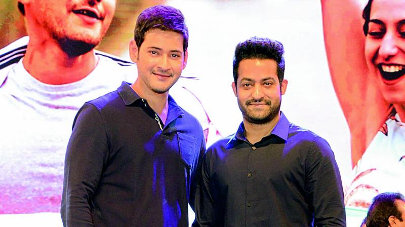 Mahesh Babu and Jr NTR at the pre-release event of Bharat Ane Nenu. Mahesh Babu and Jr NTR at the pre-release event of Bharat Ane Nenu.