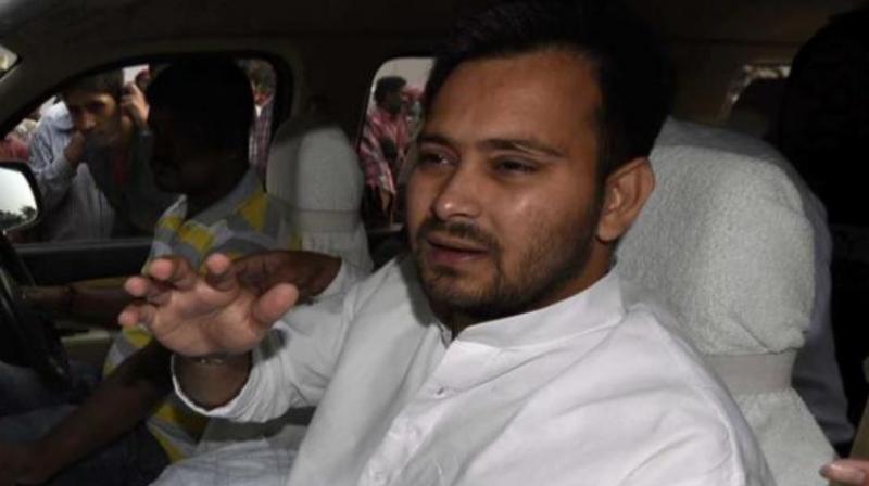 RJD leaders raised slogans and demanded the resignation of Health Minister Mangal Pandey over the deaths in Muzaffarpur. (Photo: PTI) RJD leaders raised slogans and demanded the resignation of Health Minister Mangal Pandey over the deaths in Muzaffarpur. (Photo: PTI)