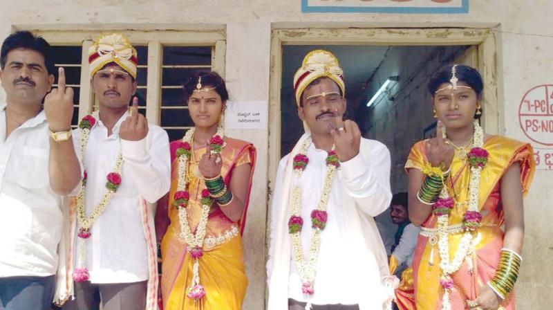 Newly married couples after voting in the Chincholi Assembly bypoll on Sunday. Newly married couples after voting in the Chincholi Assembly bypoll on Sunday.