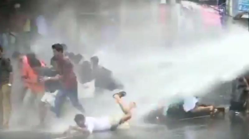 Kerala police on Sunday used high power water cannon to disperse protestors of National youth fronts like Akhil Bhartiya Vidyarthi Parishad (ABVP) and Bhartiya Janata Yuva Morcha (BJYM). (Photo: Twitter I ANI). Kerala police on Sunday used high power water cannon to disperse protestors of National youth fronts like Akhil Bhartiya Vidyarthi Parishad (ABVP) and Bhartiya Janata Yuva Morcha (BJYM). (Photo: Twitter I ANI).