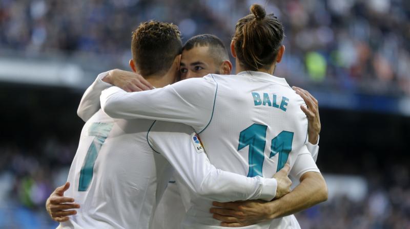Ronaldo then surrendered the opportunity to score a hat-trick by offering Benzema penalty-taking duties after Bale was brought down, and the Frenchman made no mistake, converting from the spot in the 89th minute.(Photo: AP) Ronaldo then surrendered the opportunity to score a hat-trick by offering Benzema penalty-taking duties after Bale was brought down, and the Frenchman made no mistake, converting from the spot in the 89th minute.(Photo: AP)