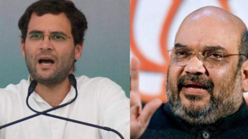 Congress president Rahul Gandhi (L), BJP national chief Amit Shah (R). (Photo: PTI) Congress president Rahul Gandhi (L), BJP national chief Amit Shah (R). (Photo: PTI)
