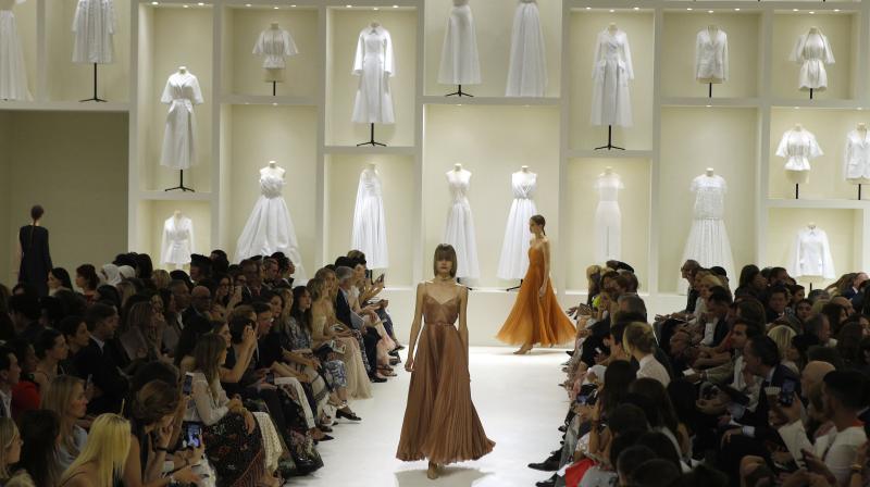Models wears creations for Dior Haute Couture Fall-Winter 2018/2019 fashion collection presented Monday, July 2, 2018 in Paris.(Photo: AP) Models wears creations for Dior Haute Couture Fall-Winter 2018/2019 fashion collection presented Monday, July 2, 2018 in Paris.(Photo: AP)