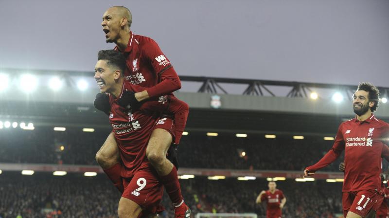 Firmino celebrates with his teammate Fabinho and Salah after scoring his side's second goal during the match between Liverpool and Crystal Palace. (Photo: AP) Firmino celebrates with his teammate Fabinho and Salah after scoring his side's second goal during the match between Liverpool and Crystal Palace. (Photo: AP)