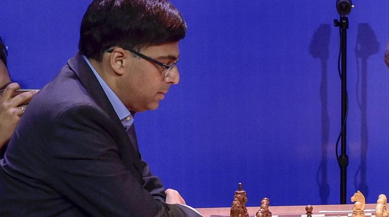 The Indian ace took his tally to 5.5 points out of a possible eight and is matched only by reigning world champion Carlsen. (Photo: PTI) The Indian ace took his tally to 5.5 points out of a possible eight and is matched only by reigning world champion Carlsen. (Photo: PTI)