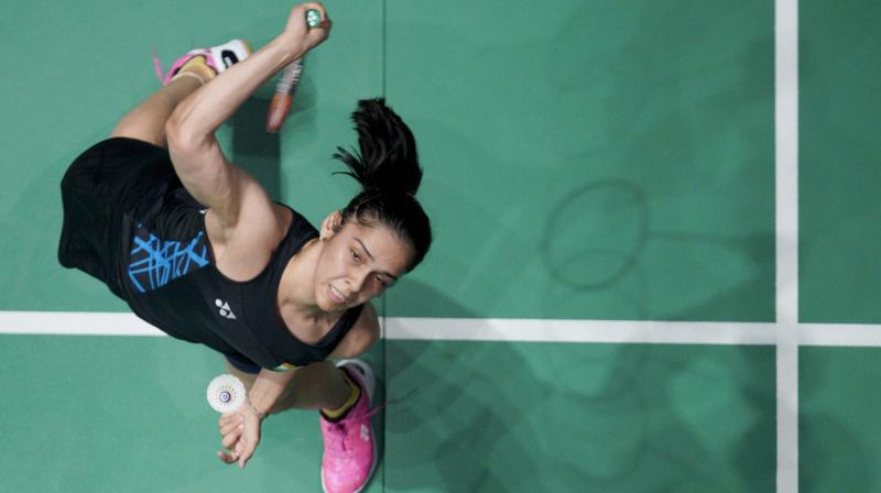 Saina, who had reached the semifinals last week at the Malaysia Masters, recovered from a first-game loss to secure a 7-21 21-16 21-11 win over local hope Dinar Dyah Ayustine, ranked 50th. (Photo: AP) Saina, who had reached the semifinals last week at the Malaysia Masters, recovered from a first-game loss to secure a 7-21 21-16 21-11 win over local hope Dinar Dyah Ayustine, ranked 50th. (Photo: AP)