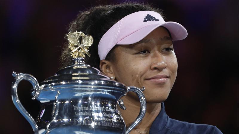 Naomi Osaka holds her trophy after defeating Petra Kvitova during the women's singles final at the Australian Open. (Photo: AP) Naomi Osaka holds her trophy after defeating Petra Kvitova during the women's singles final at the Australian Open. (Photo: AP)