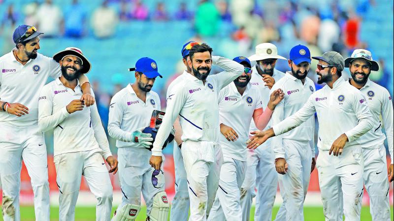 Team India celebrate after winning the second Test against South Africa in Pune. Team India celebrate after winning the second Test against South Africa in Pune.