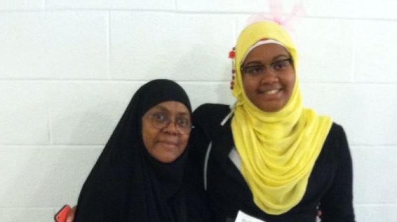 Je'Nan Hayes (right) of Watkins Mill High School in Gaithersburg, Maryland, was barred from playing a basketball game at her high school because of the headscarf she was wearing. (Photo: Facebook) Je'Nan Hayes (right) of Watkins Mill High School in Gaithersburg, Maryland, was barred from playing a basketball game at her high school because of the headscarf she was wearing. (Photo: Facebook)