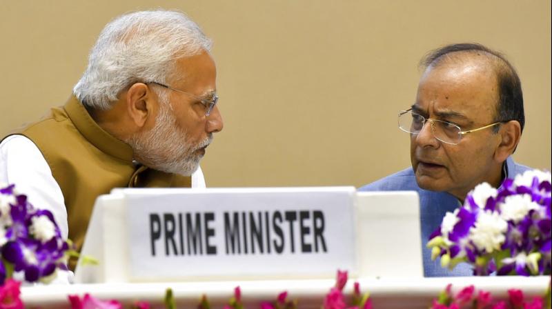 Prime Minister Narendra Modi talks with Finance Minister Arun Jaitley at a function to launch the MSME Support and Outreach Programme, in New Delhi. (Photo: PTI) Prime Minister Narendra Modi talks with Finance Minister Arun Jaitley at a function to launch the MSME Support and Outreach Programme, in New Delhi. (Photo: PTI)