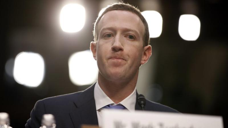 Facebook CEO Mark Zuckerberg testifies before a joint hearing of the Commerce and Judiciary Committees on Capitol Hill in Washington, Tuesday, April 10, 2018, about the use of Facebook data to target American voters in the 2016 election. (AP Photo/Alex Brandon) Facebook CEO Mark Zuckerberg testifies before a joint hearing of the Commerce and Judiciary Committees on Capitol Hill in Washington, Tuesday, April 10, 2018, about the use of Facebook data to target American voters in the 2016 election. (AP Photo/Alex Brandon)
