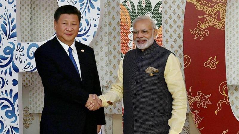The summit is being seen as an effort by India and China to rebuild trust and improve ties that were hit by the 73-day-long Doklam standoff last year. (Photo: PTI/File) The summit is being seen as an effort by India and China to rebuild trust and improve ties that were hit by the 73-day-long Doklam standoff last year. (Photo: PTI/File)