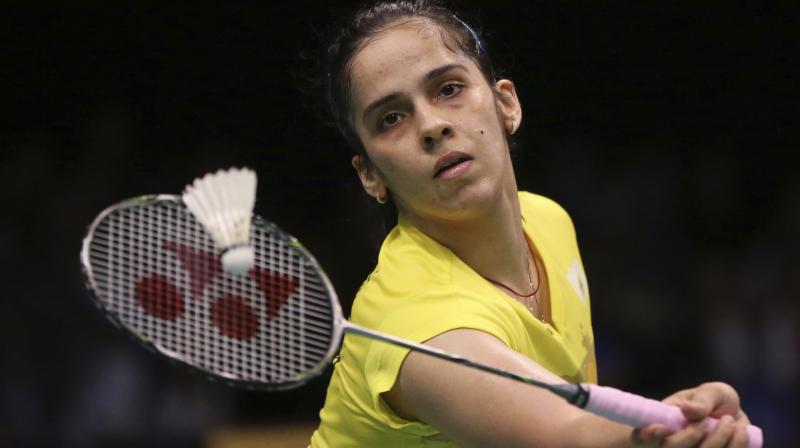 Saina later filed a written complaint to the IOA over their failure about informing her that her father would be denied access and said she was shown lack of respect due to which she decided to pull out. (Photo: AFP) Saina later filed a written complaint to the IOA over their failure about informing her that her father would be denied access and said she was shown lack of respect due to which she decided to pull out. (Photo: AFP)