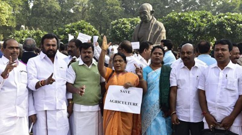 MP's of Opposition parties during a protest outside Parliament against the government’s move to demonetise high tender notes, in New Delhi on Wednesday. (Photo: PTI) MP's of Opposition parties during a protest outside Parliament against the government’s move to demonetise high tender notes, in New Delhi on Wednesday. (Photo: PTI)