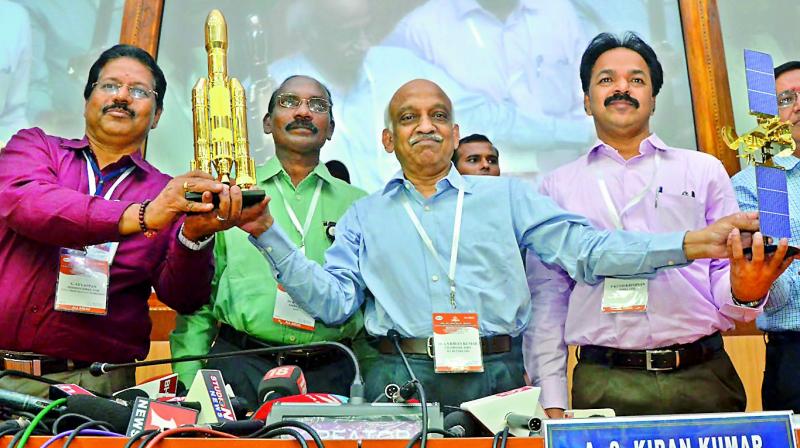 Scientists at the Satish Dhawan space centre in Sriharikota celebrate the successful launch on Monday. Scientists at the Satish Dhawan space centre in Sriharikota celebrate the successful launch on Monday.