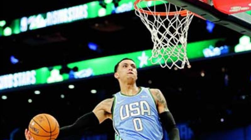 Team USA’s Kyle Kuzma goes for a dunk against Team World during the NBA All-Star Rising Stars game on Friday in Charlotte. (Photo: AP) Team USA’s Kyle Kuzma goes for a dunk against Team World during the NBA All-Star Rising Stars game on Friday in Charlotte. (Photo: AP)