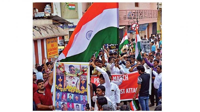 People take out a protest march in Bengaluru condemning the Pulwama terror attack. (Photo: KPN) People take out a protest march in Bengaluru condemning the Pulwama terror attack. (Photo: KPN)
