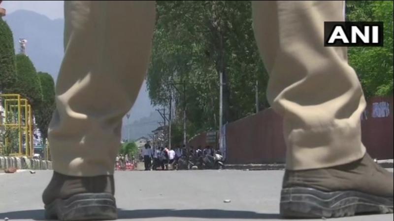 A score of students of Amar Singh College demonstrated against the rape of a minor and hurled stones at the security personnel. (Photo: ANI) A score of students of Amar Singh College demonstrated against the rape of a minor and hurled stones at the security personnel. (Photo: ANI)
