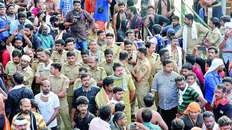Devotees stage a protest at Sabarimala temple (Photo: AP) Devotees stage a protest at Sabarimala temple (Photo: AP)