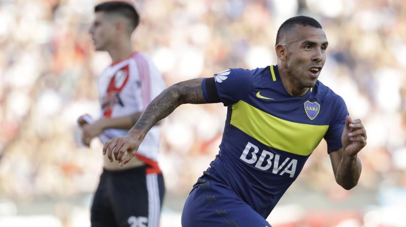 Tevez's $42 million annual salary would make him the world's best-paid footballer in terms of earnings from his club, catapulting him past the previous top three: Cristiano Ronaldo, said to take home $23 million a year after tax from Real Madrid, his teammate Gareth Bale, and FC Barcelona's Lionel Messi. (Photo: AP) Tevez's $42 million annual salary would make him the world's best-paid footballer in terms of earnings from his club, catapulting him past the previous top three: Cristiano Ronaldo, said to take home $23 million a year after tax from Real Madrid, his teammate Gareth Bale, and FC Barcelona's Lionel Messi. (Photo: AP)