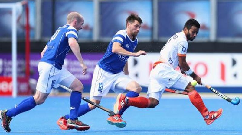 Indian captain Manpreet Singh (White) in action against Scotland (Photo: FIH) Indian captain Manpreet Singh (White) in action against Scotland (Photo: FIH)