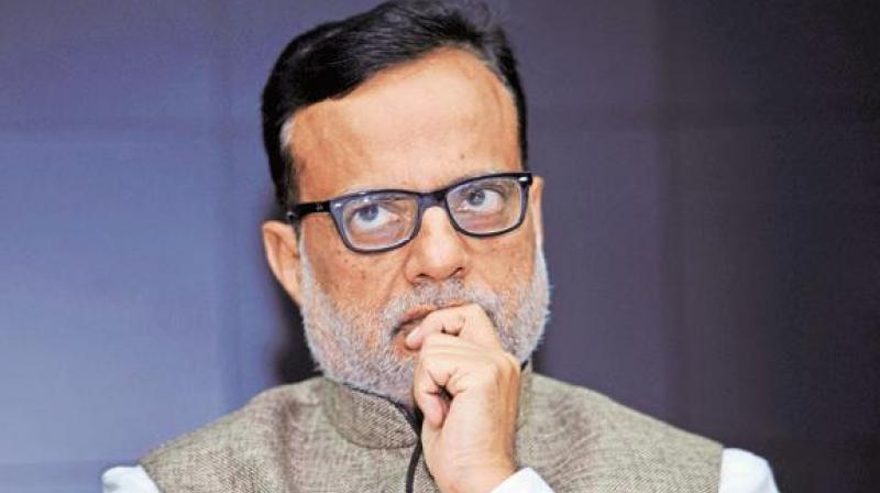 Hasmukh Adhia Hasmukh Adhia