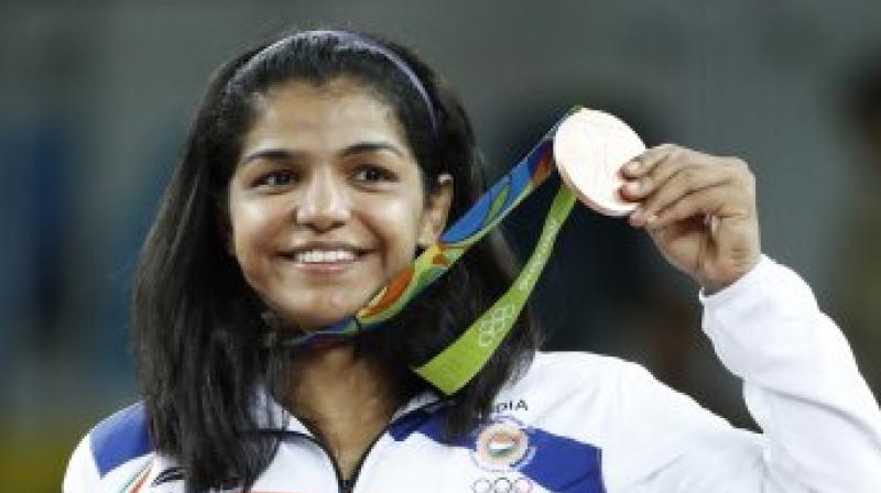 Sakshi Maliik after winning bronze medal in the Rio Olympics last year. (Photo: AFP) Sakshi Maliik after winning bronze medal in the Rio Olympics last year. (Photo: AFP)
