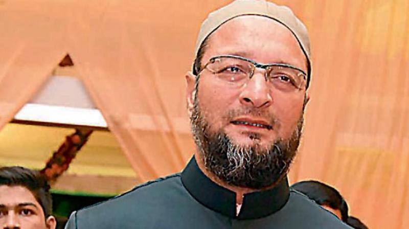 'One can stand on official occasions like 15 August, 26 January, etc,' AIMIM president Asaduddin Owaisi said. (File photo) 'One can stand on official occasions like 15 August, 26 January, etc,' AIMIM president Asaduddin Owaisi said. (File photo)