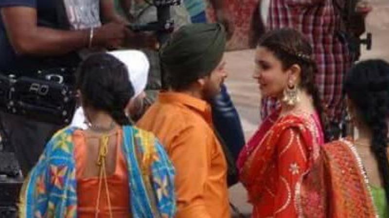 Shah Rukh and Anushka on the sets of the film in Punjab. Shah Rukh and Anushka on the sets of the film in Punjab.