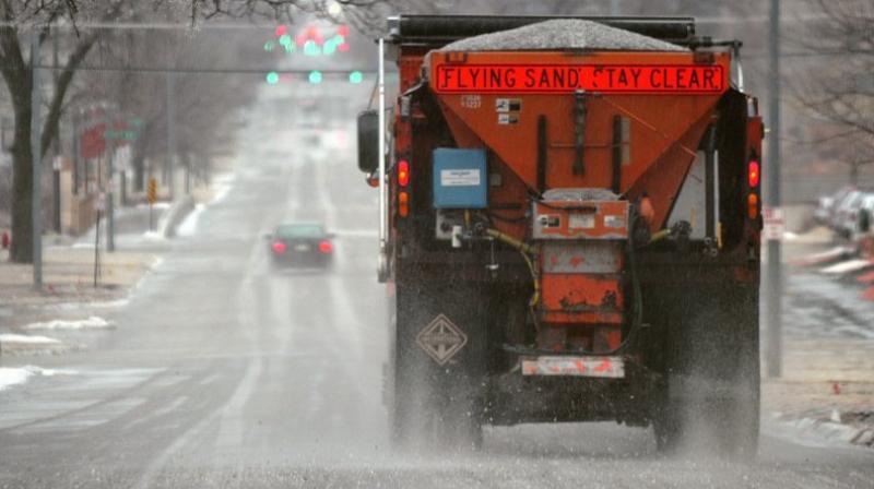 This photo shows a city truck is spreading salt on Q Street in Lincoln, Neb. Scientists are starting to raise concerns about road salt’s impact on the environment, especially drinking water, because lakes and streams near roads are showing elevated levels of sodium and chloride. (Photo: AP) This photo shows a city truck is spreading salt on Q Street in Lincoln, Neb. Scientists are starting to raise concerns about road salt’s impact on the environment, especially drinking water, because lakes and streams near roads are showing elevated levels of sodium and chloride. (Photo: AP)