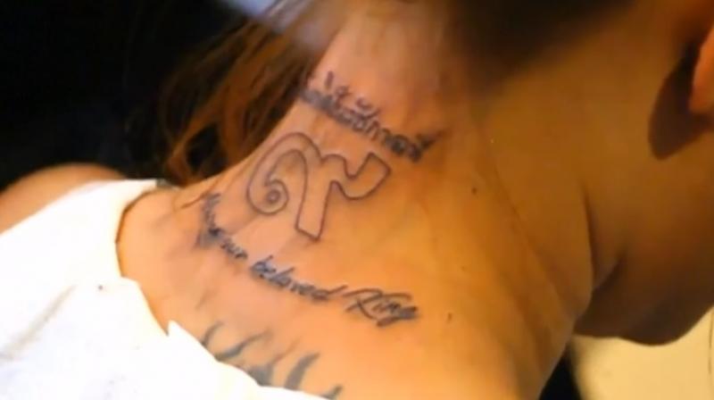 Many Thais are heading to tattoo parlours to get a lasting memory of the only monarch they have ever known. (Credit: YouTube) Many Thais are heading to tattoo parlours to get a lasting memory of the only monarch they have ever known. (Credit: YouTube)