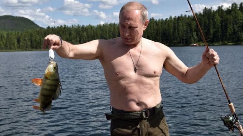Vladimir Putin fishes in the remote Tuva region in southern Siberia. (Photo: AFP) Vladimir Putin fishes in the remote Tuva region in southern Siberia. (Photo: AFP)