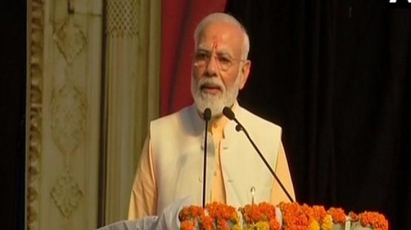Addressing a gathering at Ramleela ground in Dwarka during Dusshera celebrations for the first time, the Prime Minister began his speech by raising slogans of 'Jai Shri Rama' amid chants of 'Modi Modi' by the people. (Photo: ANI) Addressing a gathering at Ramleela ground in Dwarka during Dusshera celebrations for the first time, the Prime Minister began his speech by raising slogans of 'Jai Shri Rama' amid chants of 'Modi Modi' by the people. (Photo: ANI)