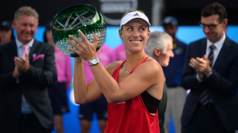 After some tight early service games, Barty double-faulted to hand Kerber the first break and a 3-2 lead, and the German served out the opening set with little trouble. (Photo: AFP) After some tight early service games, Barty double-faulted to hand Kerber the first break and a 3-2 lead, and the German served out the opening set with little trouble. (Photo: AFP)