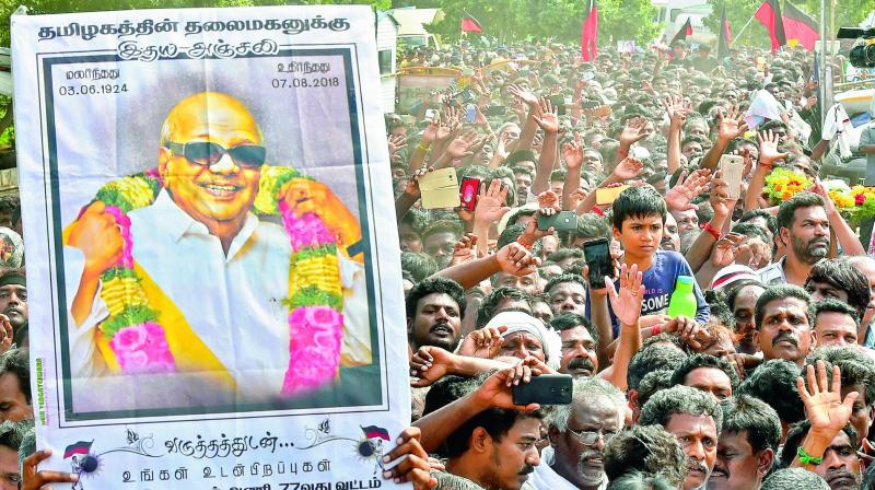 Supporters, in large numbers, arrive to pay their last respects to DMK chief M. Karunanidhi at Rajaji Hall in Chennai on Wednesday. (Photo: AP) Supporters, in large numbers, arrive to pay their last respects to DMK chief M. Karunanidhi at Rajaji Hall in Chennai on Wednesday. (Photo: AP)