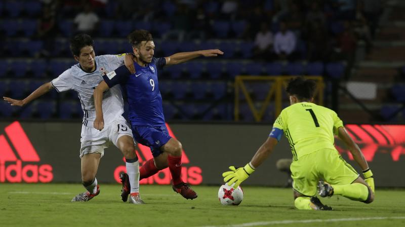 France's Amine Gouiri (Jersey no 9) in action against Japan on Wednesday. (Photo: AP) France's Amine Gouiri (Jersey no 9) in action against Japan on Wednesday. (Photo: AP)