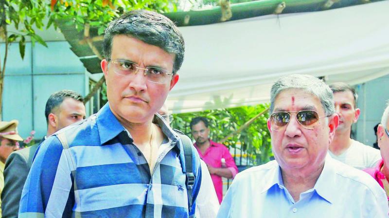 Sourav Ganguly with N. Srinivasan. Sourav Ganguly with N. Srinivasan.