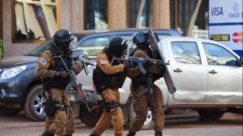 Security forces arrived at the scene with armored vehicles after reports of shots fired near Aziz Istanbul, an upscale restaurant in Ouagadougou. (Photo: AFP) Security forces arrived at the scene with armored vehicles after reports of shots fired near Aziz Istanbul, an upscale restaurant in Ouagadougou. (Photo: AFP)