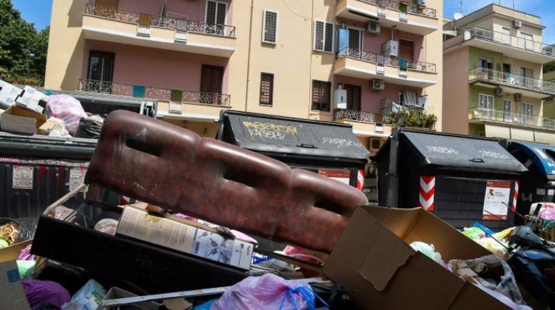 Some residents make matters worse by simply dumping their old mattresses, fridges and sofas next to garbage bins. (Photo: AFP) Some residents make matters worse by simply dumping their old mattresses, fridges and sofas next to garbage bins. (Photo: AFP)