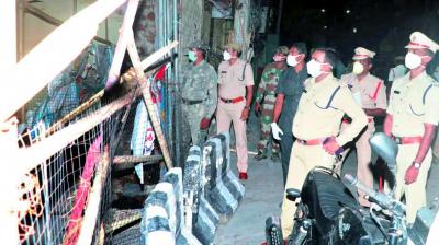 Guntur Rural SP Ch. Vijaya Rao, along with other officials, inspects a red zone at Varavakatta area in Narasaraopet town of Guntur district. Tejo Roy Eleti