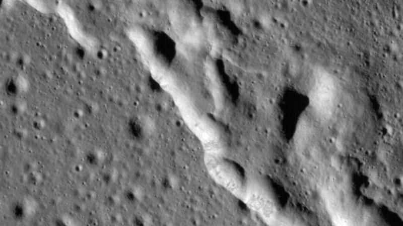 Since the moon's crust is brittle, these forces cause its surface to break as the interior shrinks, resulting in so-called thrust faults, where one section of crust is pushed up over an adjacent section. (Photo: AFP) Since the moon's crust is brittle, these forces cause its surface to break as the interior shrinks, resulting in so-called thrust faults, where one section of crust is pushed up over an adjacent section. (Photo: AFP)