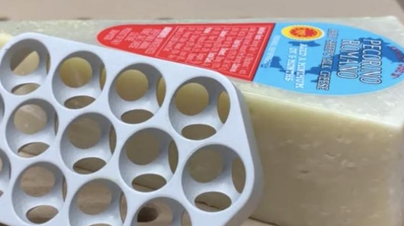 YouTuber Winston Moy took the charge of testing if the USD 6,000 computer's chassis can actually grate cheese. (Photo: YouTube) YouTuber Winston Moy took the charge of testing if the USD 6,000 computer's chassis can actually grate cheese. (Photo: YouTube)