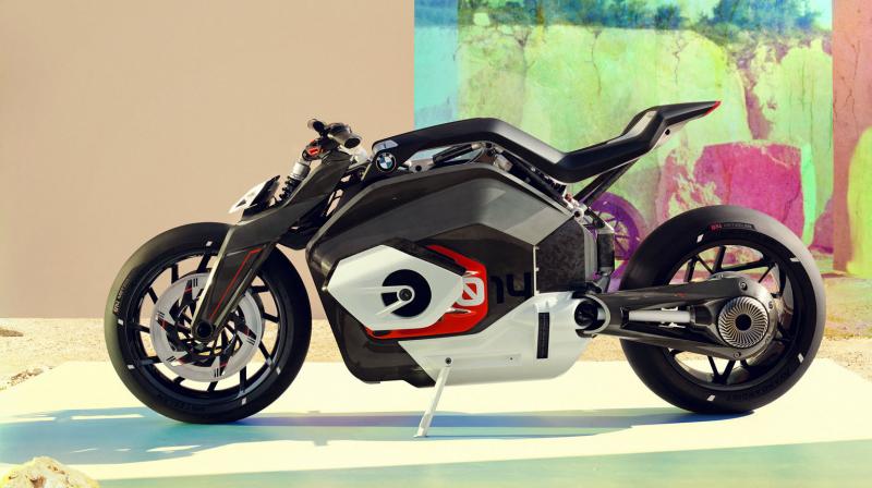 Showcased at the brand’s NextGen event in Munich, the Vision DC Roadster incorporates the iconic styling of BMW’s two-cylinder boxer engine and places a battery inside. Showcased at the brand’s NextGen event in Munich, the Vision DC Roadster incorporates the iconic styling of BMW’s two-cylinder boxer engine and places a battery inside.