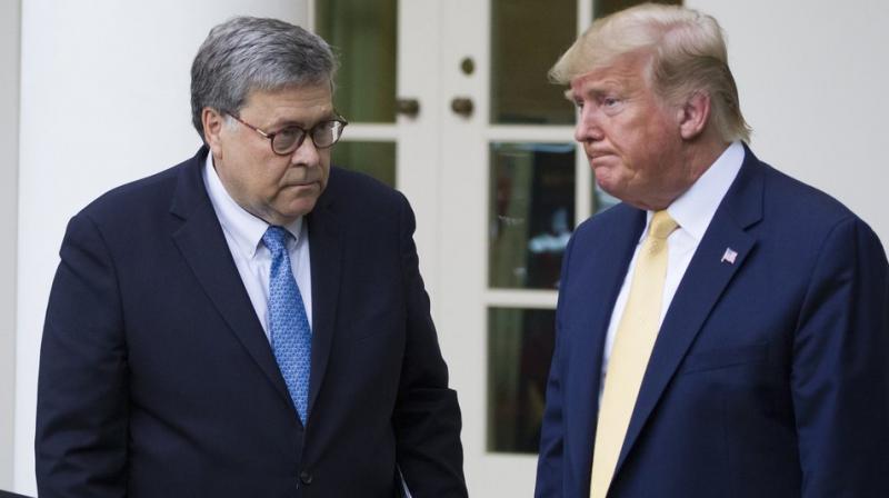 File photo shows attorney General William Barr, left, and President Donald Trump turn to leave after speaking in the Rose Garden of the White House, in Washington.AP photo