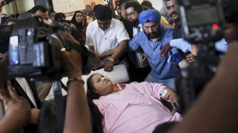 Egyptian patient Eman Ahmed, who almost spent two months undergoing weight-reduction procedure at Saifee Hospital, is being shifted to Burjeel Hospital in Abu Dhabi, where doctors will continue her rehabilitation and weight-reduction treatment, in Mumbai. (Photo: PTI) Egyptian patient Eman Ahmed, who almost spent two months undergoing weight-reduction procedure at Saifee Hospital, is being shifted to Burjeel Hospital in Abu Dhabi, where doctors will continue her rehabilitation and weight-reduction treatment, in Mumbai. (Photo: PTI)